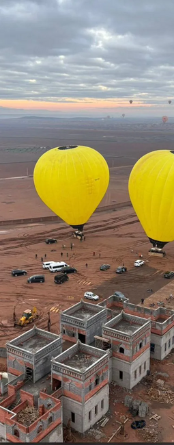 Aerial view of hot air balloons over the Marrakech desert